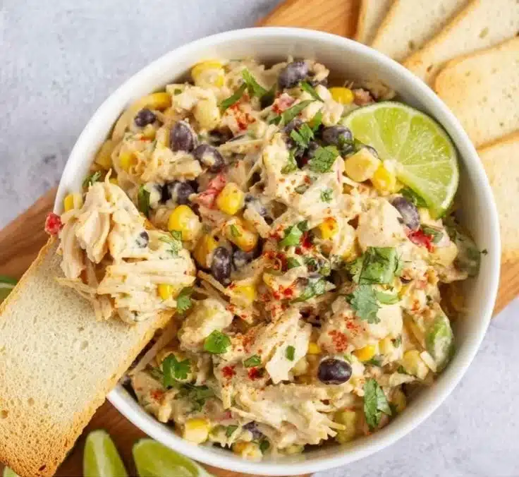 Colorful Southwest Chicken Salad with grilled chicken, veggies, and dressing