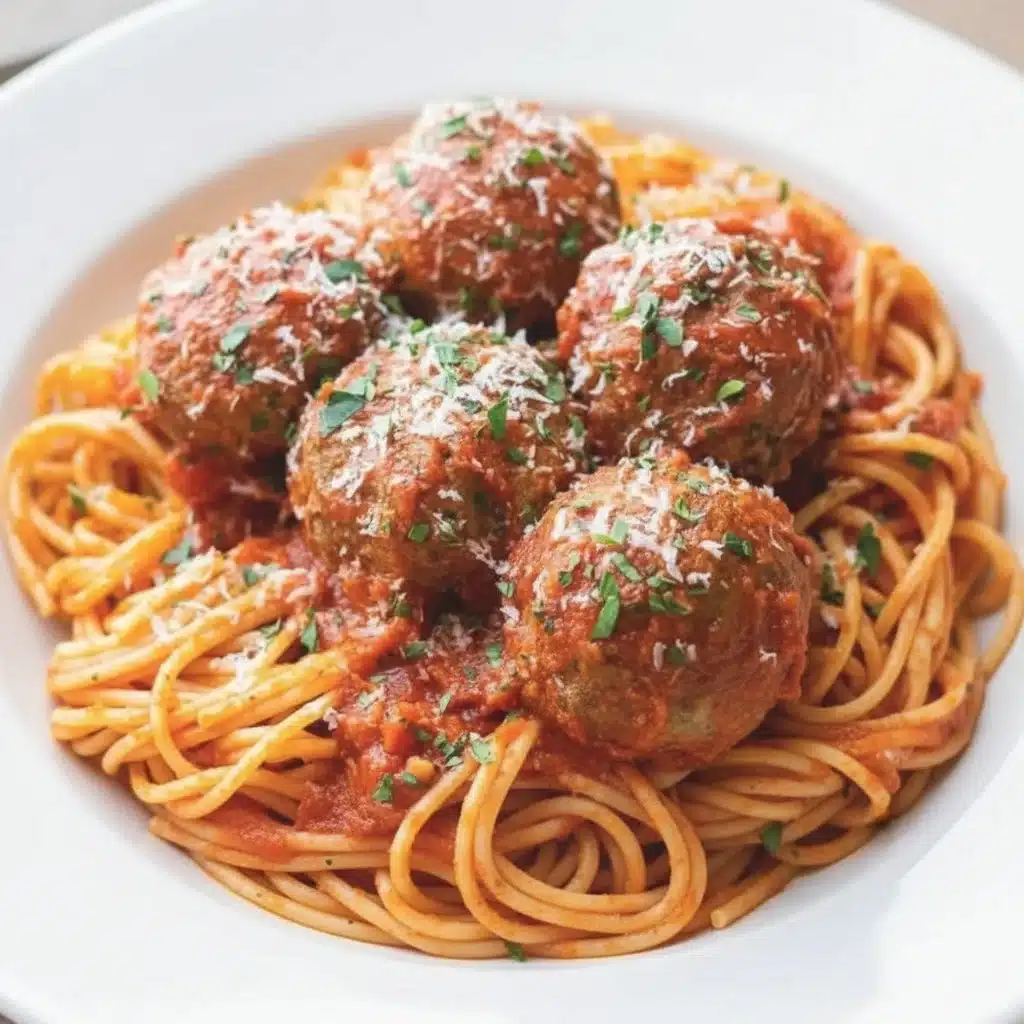 Delicious oven-baked Italian meatballs served with marinara sauce